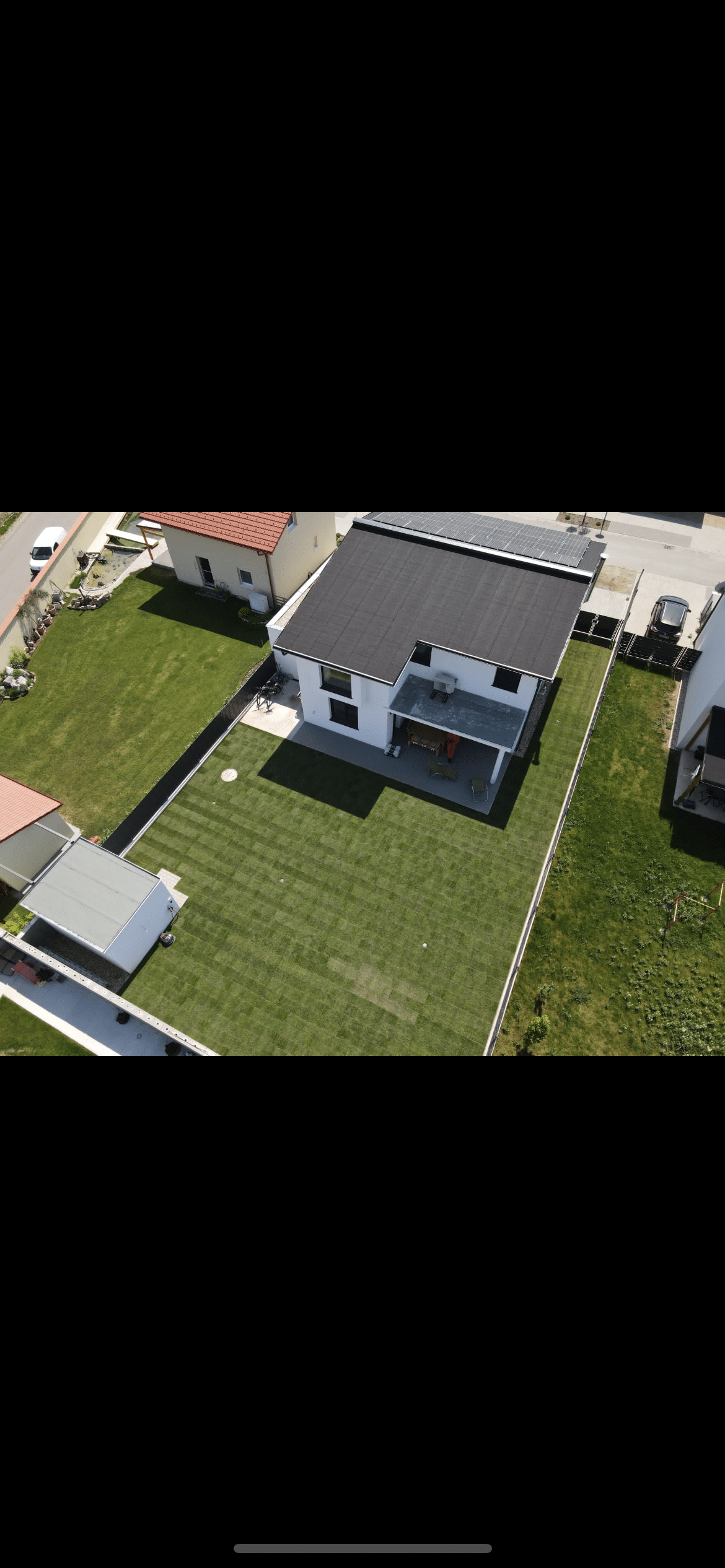 rollrasenverlegung haus von oben